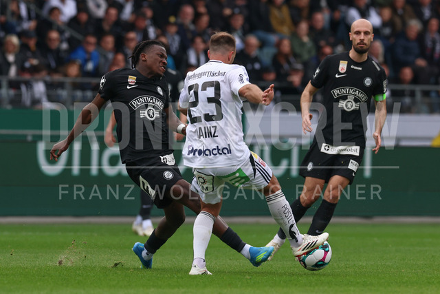 SK Puntigamer Sturm Graz vs TSV Egger Glas Hartberg – Championship Group    | Graz, Austria, 12.Apr.26 - SOCCER - ADMIRAL Bundesliga, SK Puntigamer Sturm Graz vs TSV Egger Glas Hartberg. The image shows Seedy Jatta (STU) and Tobias Kainz (Hartberg).    
