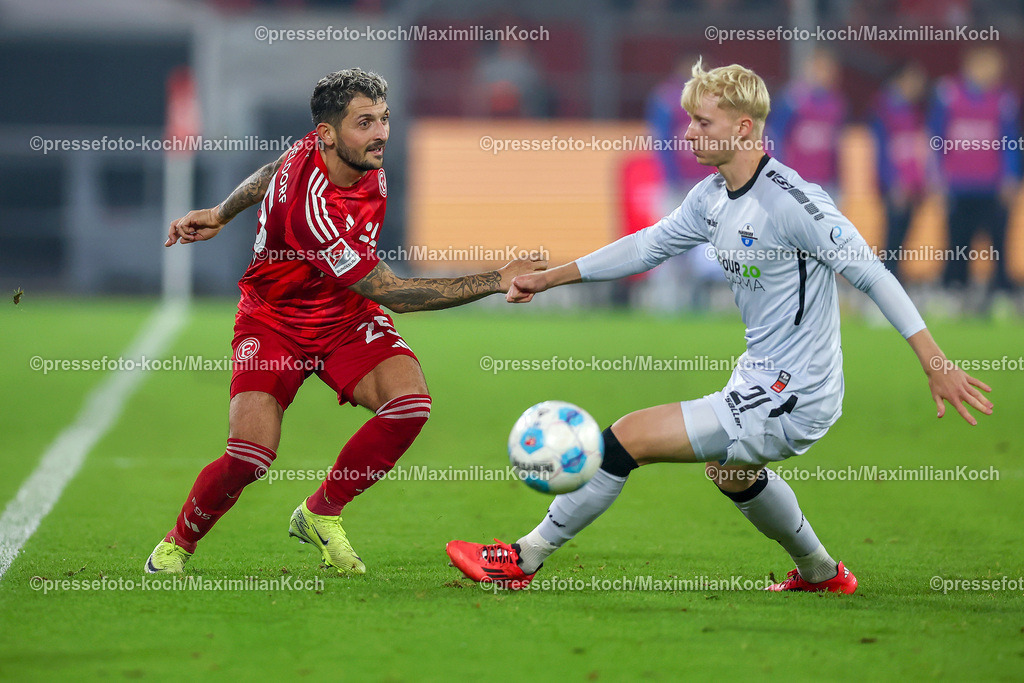 Due09112401063 | 09.11.2024, Fußball, Fortuna Düsseldorf - SC Paderborn 07, 2. Bundesliga, Merkur Spiel-Arena, Saison 2024 2025: Matthias Zimmermann (Fortuna Düsseldorf #25) gegen Anton Bäuerle (Paderborn #21)DFB regulations prohibit any use of photographs as image sequences and or quasi-video.