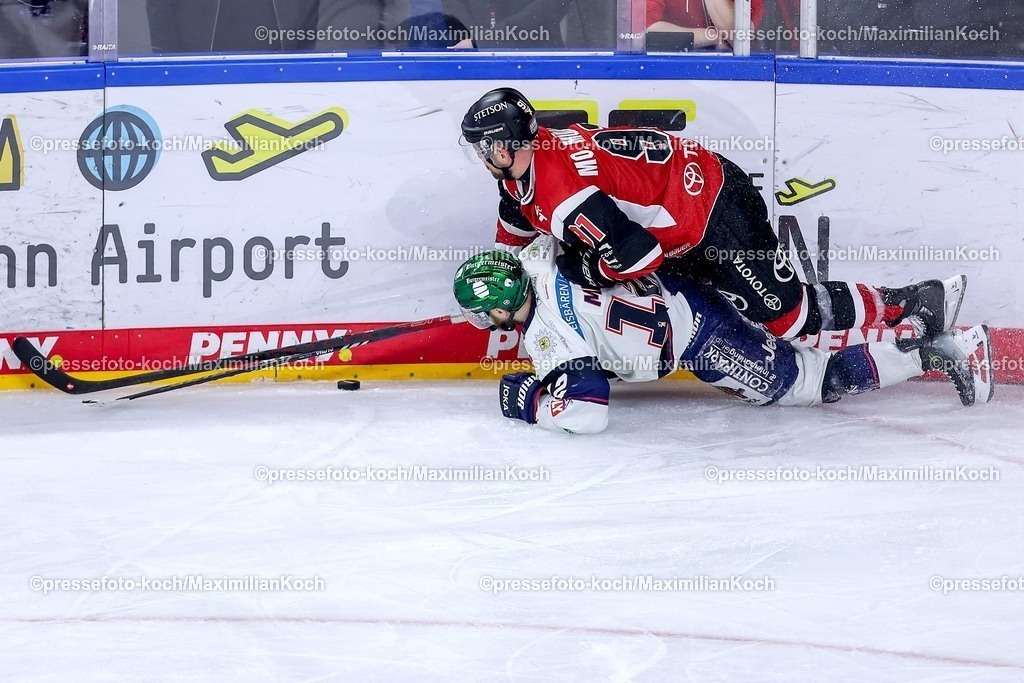 KEC15042601183 | 15.04.2026, Eishockey, DEL Halbfinale Play-Offs, Kölner Haie - Eisbären Berlin, Spiel 4, Lanxess-Arena Köln: Moritz Müller (Kölner Haie #91) im Handgemenge Zweikampf gegen  Eric Mik (Eisbären Berlin #12)