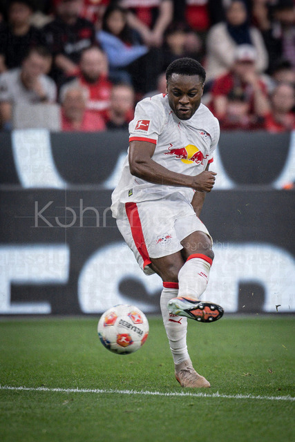 German Bundesliga, Bayer 04 Leverkusen vs. RB Leipzig, 02.05.2026 | LEVERKUSEN, GERMANY - MAY 2, 2026 :  Ridle Baku (RB Leipzig, 17) shoots a ball during the German Bundesliga match on gameday 32 between Bayer 04 Leverkusen vs. RB Leipzig at BayArena on May 2, 2026 in Leverkusen, Germany. DFL REGULATIONS PROHIBIT ANY USE OF PHOTOGRAPHS AS IMAGE SEQUENCES AND/OR QUASI-VIDEO.