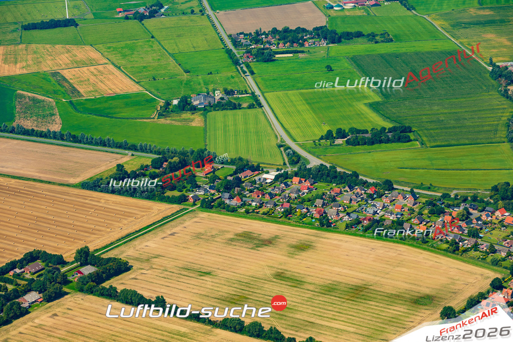 Klassische Luftaufnahme ohne Drohne zeigt:Wybelsum bei Emden - Die Luftbildaufnahme wurde 2025 vom UL-Flugzeug heraus erstellt ( keine Drohnenaufnahme ) - Hochauflösende Luftaufnahme -Nicht vergleichbar mit Google Maps oder Satelittenbilder- Die Geschenkidee !Mit Lizenz und Bildrechte bestellbar