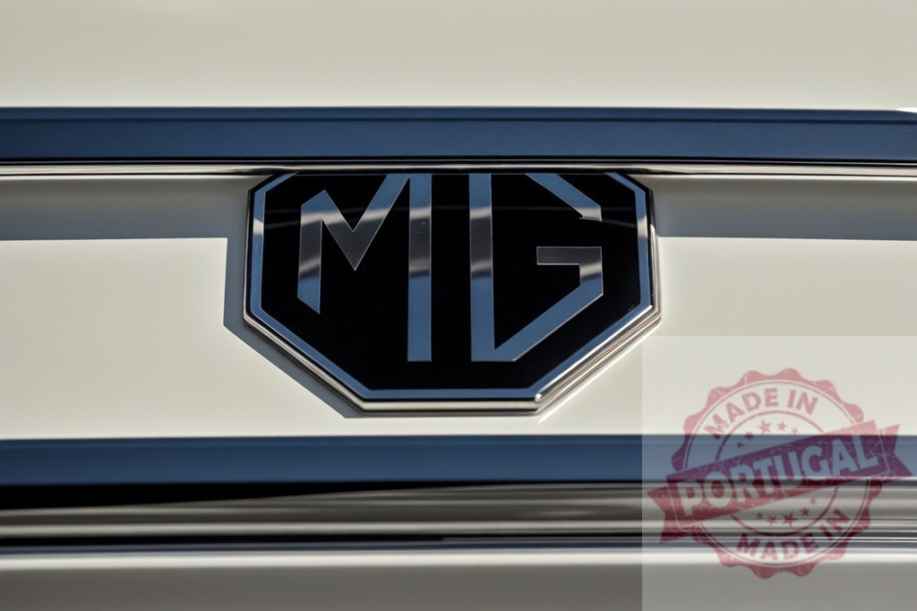 MG car brand logo emblem on white vehicle | MG car badge reflecting light on a smooth white surface - Realized with Pictrs.com
