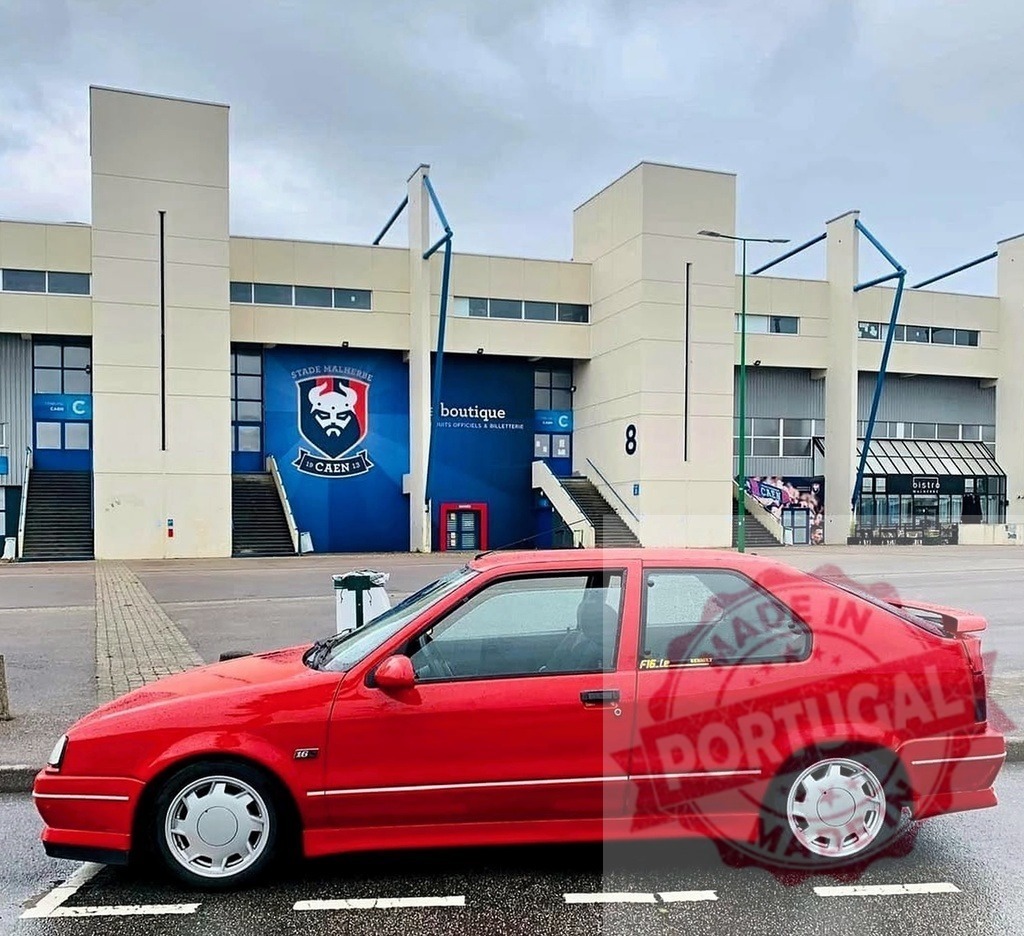 Renault 19 16S red sports car parked at Stade Michel d'Ornano | Red Renault 19 16S parked near the modern facade of Stade Michel d'Ornano in Caen - Realisiert mit Pictrs.com
