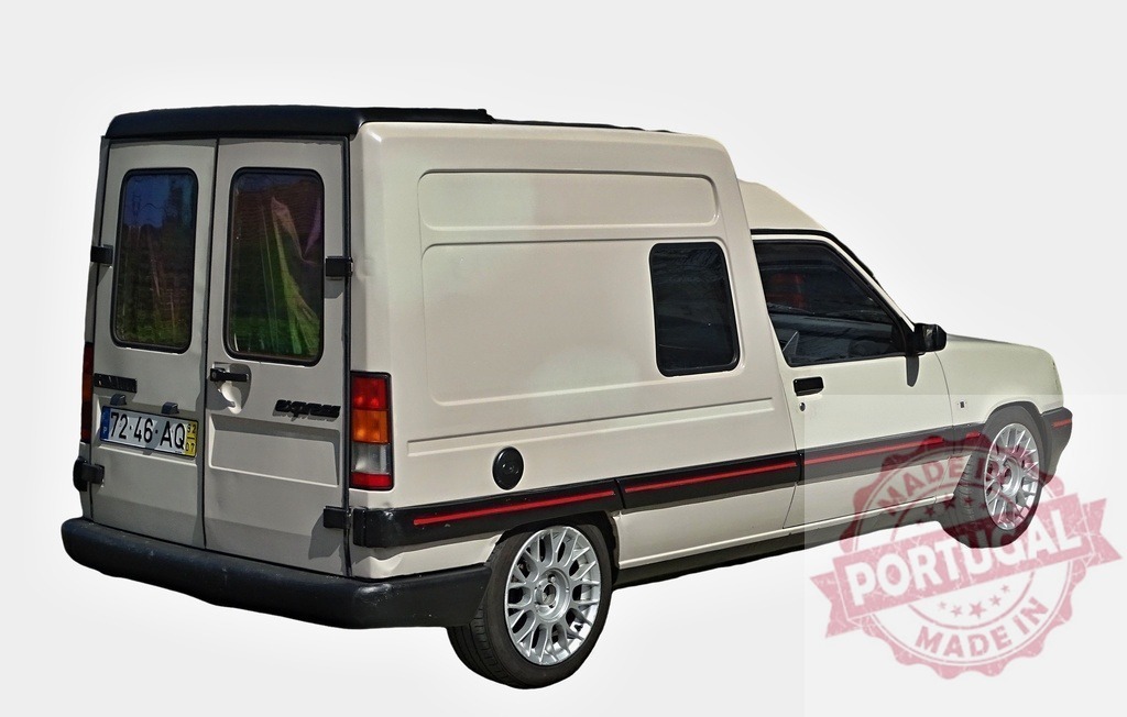 White Renault Express van isolated on a white background | Renault Express showing its rear part on a white background - Realized with Pictrs.com