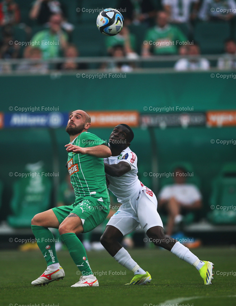 A_LUI_14042024_17 | SPORT,FUSSBALL.ADMIRAL BUNDESLIGA SK RAPID-AUSTRIA KLAGENFURT14.04.2024 IM BILD: LUKAS GRGIC (RAPID) UND SOLOMON BONNAH  (KLAGENFURT) FOTO.FOTOLUI/MW