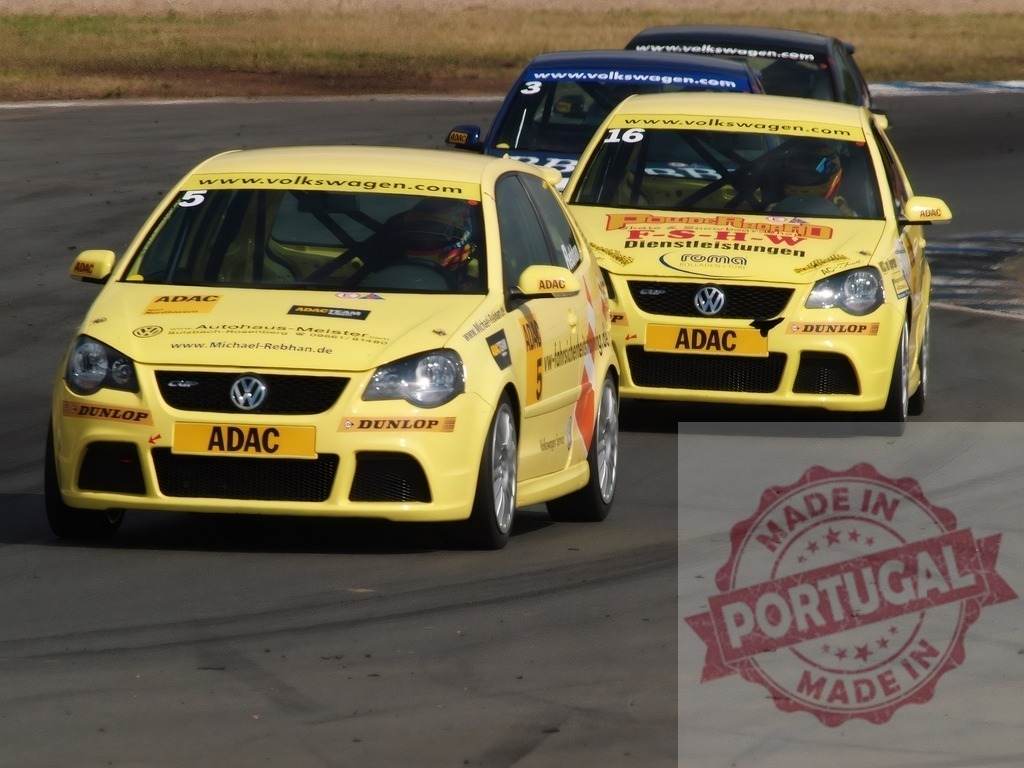 Volkswagen Polo ADAC racing cars competing on track | Yellow Volkswagen Polo ADAC Cup racing cars negotiating a turn on a circuit - Realisiert mit Pictrs.com