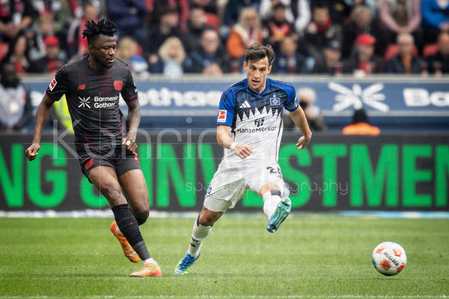 German Bundesliga, Bayer 04 Leverkusen vs. Hamburger SV, 16.05.2026 | LEVERKUSEN, GERMANY - MAY 16, 2026 :  Edmond Tapsoba (Bayer 04 Leverkusen, 12), Nicolas Capaldo (Hamburger SV, 24) during the German Bundesliga match on gameday 34 between Bayer 04 Leverkusen vs. Hamburger SV at BayArena on May 16, 2026 in Leverkusen, Germany. DFL REGULATIONS PROHIBIT ANY USE OF PHOTOGRAPHS AS IMAGE SEQUENCES AND/OR QUASI-VIDEO.