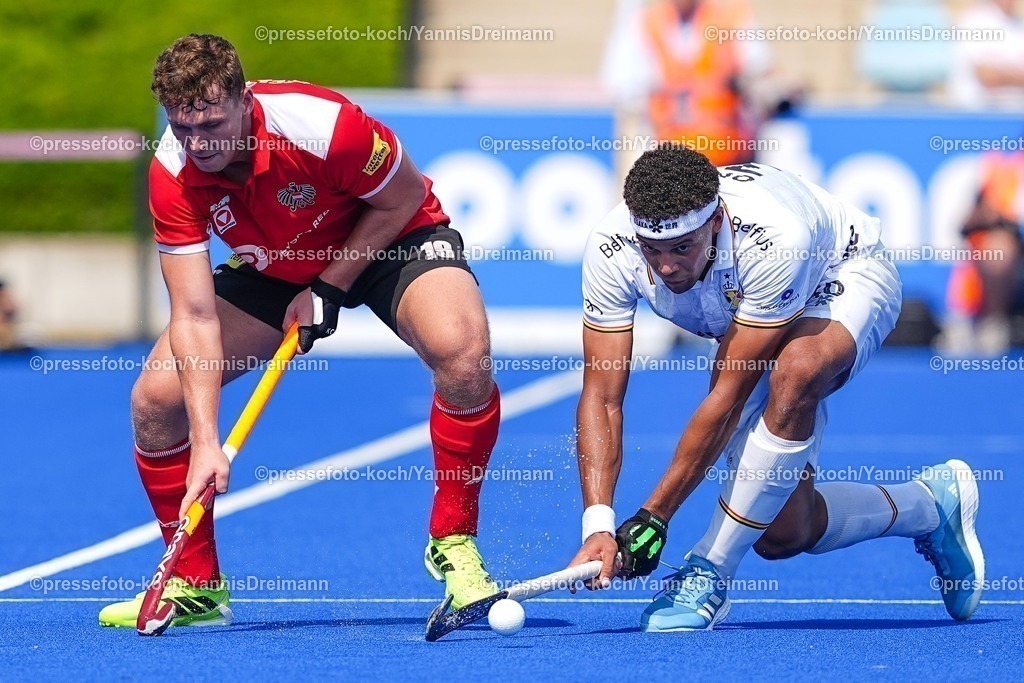 xydrx09082501041 | 09.08.2025, xydrx, Herren EuroHockey Championship 2025, Gruppenphase, Gruppe a, Belgien - Österreich, Sparkassenpark Mönchengladbach: Maximilian Kelner (AUT #19) im Zweikampf gegen Nelson Onana (BEL #30)