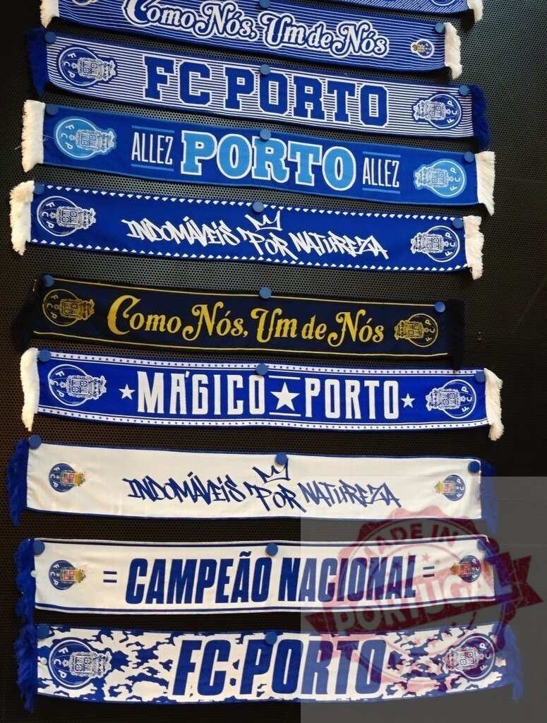 FC Porto football club fan scarves collection displaying merchandise | FC Porto fan scarves in blue and white colors displayed, representing Portugal football club merchandise - Realisiert mit Pictrs.com