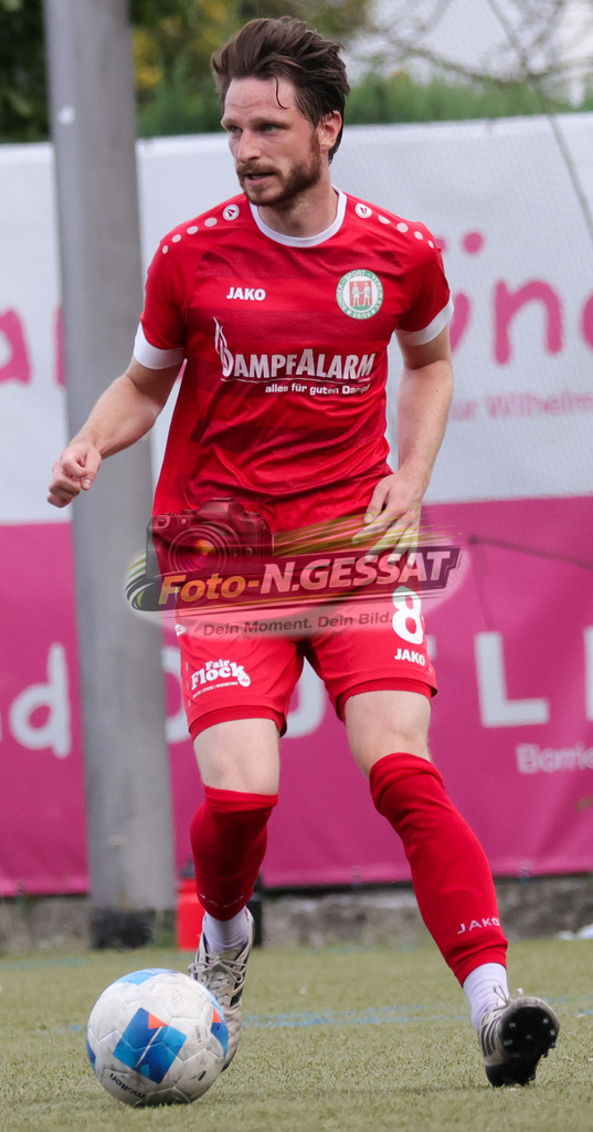 Bünder SV - TV Elverdissen | Auf dem Bild zu sehen: rot Bünder SV: Denis Müller Bünder SV, TV Elverdissen, Saison 26/27, Kreisliga A, Bünde, Deutschland - Realisiert mit Pictrs.com