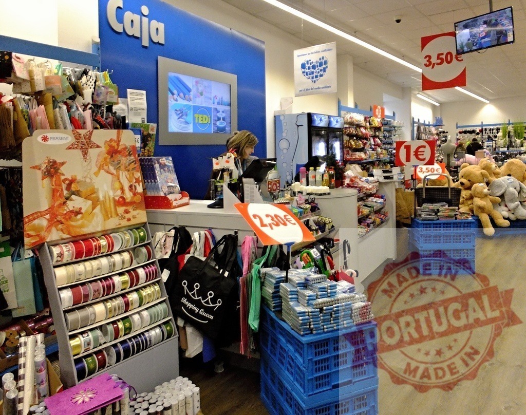 TEDi discount store cashier checking out customers | Inside TEDi store with a cashier working at the checkout counter and various products on display - Realized with Pictrs.com