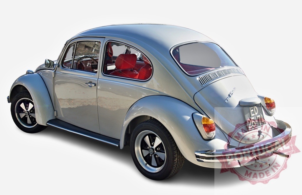 Volkswagen Beetle classic car rear view cutout | Volkswagen Beetle vintage automobile with red interior showing retro style on white background - Realized with Pictrs.com