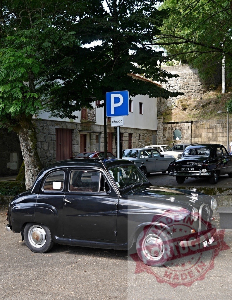 Black Austin A35 car parked in old European village street | Black vintage Austin A35 car parked in a charming European village street near stone buildings - Realisiert mit Pictrs.com