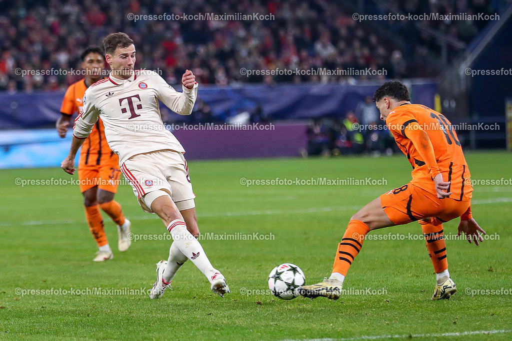 UCL10122401087 | 10.12.2024, Fußball, UEFA Champions League, Schachtar Donezk - FC Bayern München, Arena AufSchalke Gelsenkirchen, 8. Spieltag Saison 2024 2025: Leon Goretzka (Bayern #8) gegen Alaa Ghram (Schachtar Donezk #18)DFB regulations prohibit any use of photographs as image sequences and or quasi-video.