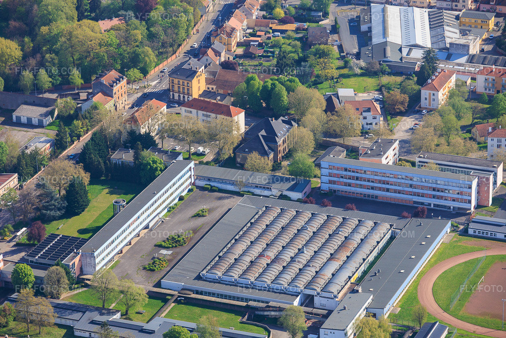 Aerial view: Lycée Henri Nominé in the district La Cité in Saargemünd in the state Moselle, France. – Photo: IMG_154562.jpg taken on 04/18/2026 by Werner Riehm/FLY-FOTO.com – Resolution of the original: 6000 x 4000 px – WWW.XN--LYCENOMINSARREGUEMINES-D8BG.FR/