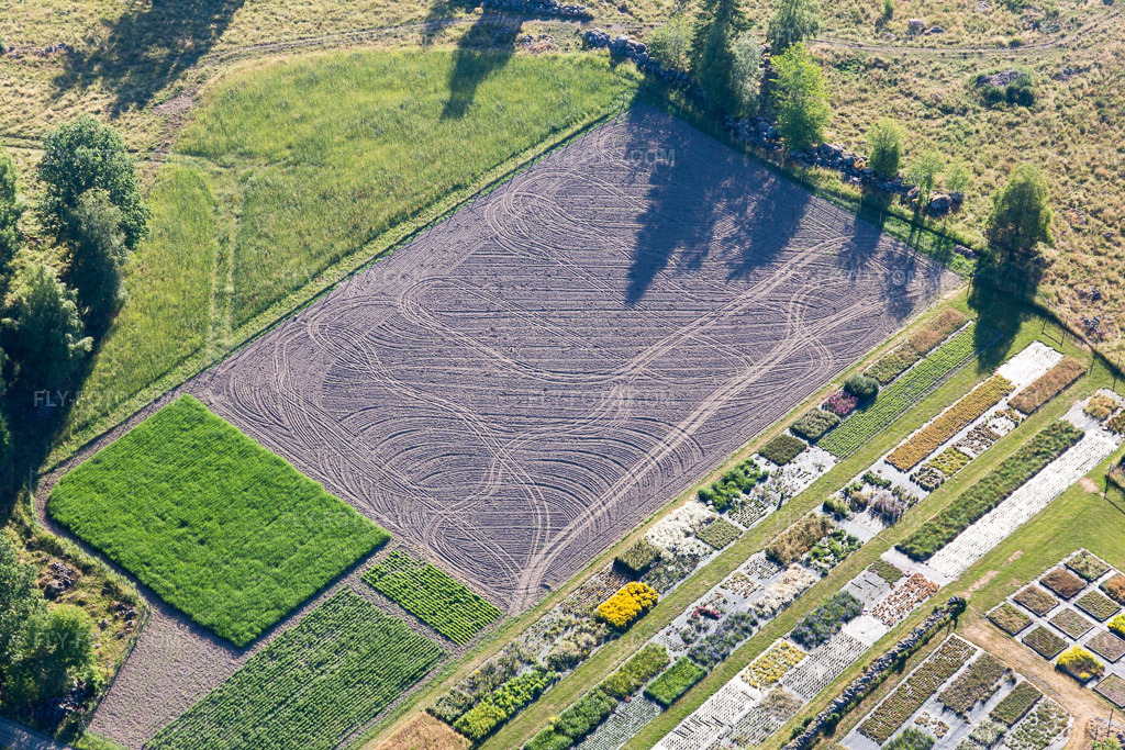 Aerial view: View of the town in Opparyd in the state Kronoberg, Sweden. – Photo: IMG_108125.jpg taken on 06/28/2018 by Werner Riehm/FLY-FOTO.com – Resolution of the original: 5472 x 3648 px