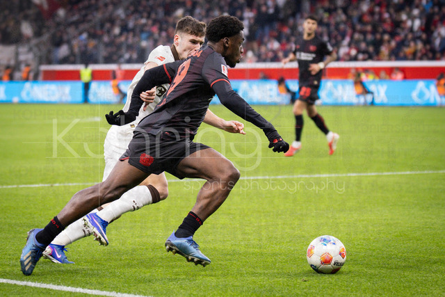 Bayer 04 Leverkusen vs. FC St. Pauli, 14.02.2026 | LEVERKUSEN, GERMANY - FEBRUARY 14: Ernest Poku (Bayer 04 Leverkusen, 19), Arkadiusz Pyrka (FC St. Pauli, 11) tackling during the Bundesliga match (gameday 22)  between Bayer 04 Leverkusen vs. FC St. Pauli at BayArena on February 14, 2026 in Leverkusen, Germany. (Photo by Axel Kohring/Beautiful Sports Int.)DFL REGULATIONS PROHIBIT ANY USE OF PHOTOGRAPHS AS IMAGE SEQUENCES AND/OR QUASI-VIDEO.