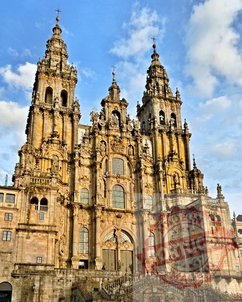 Santiago de Compostela Cathedral baroque architecture and pilgrimage landmark. Galicia - Spain | Santiago de Compostela Cathedral displaying its historic ornate facade and ancient towers against a blue sky - Realized with Pictrs.com