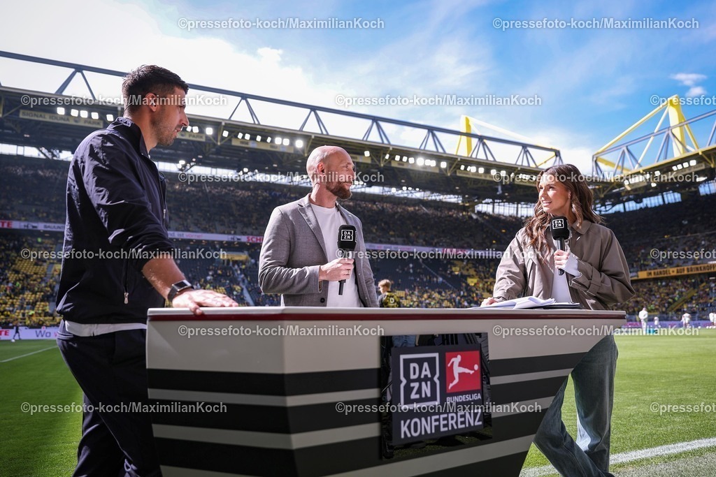 BVB11042601052 | 11.04.2026, Fußball, Borussia Dortmund - Bayer 04 Leverkusen, 1. Fußball Bundesliga, 29. Spieltag, Signal Iduna Park, Saison 2025 2026: Sami Khedira, Sportdirektor Ole Book (BVB #ob) und Moderatorin Laura Wontorra (DAZN)   DFB regulations prohibit any use of photographs as image sequences and or quasi-video.
