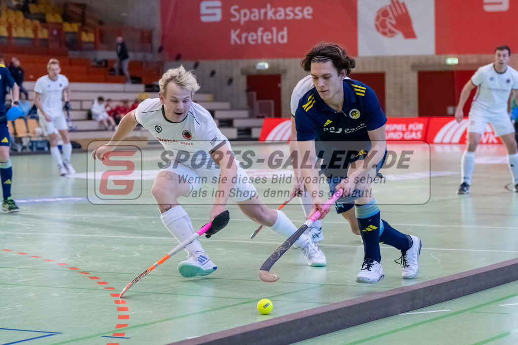 HK_20250118_101727 | 1/4 Finale 1. Bundesliga Halle Herren Crefelder HTC - Zehlendorfer Wespen am 18.1.2025 Halle Glockenspitz, Krefeld , LangHeinrich Finn ( Crefelder HTC #22 ) , Aaron Posdziech ( Zehlendorfer Wespen #44 )