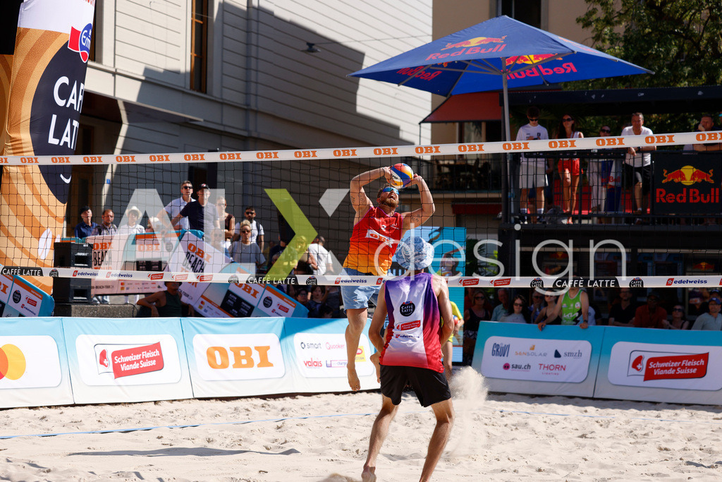 Obi BeachTour 2026 - Basel | BASEL, SWITZERLAND - JULY 18: MORITZ KINDL (AUT) attack / spike during the Obi BeachTour 2026 match between HAGENBUCH / HAUSSENER (SUI) and LEITNER / KINDL (AUT) at Barfüsserplatz on July 18, 2026 in Basel, Switzerland. - Realisiert mit Pictrs.com