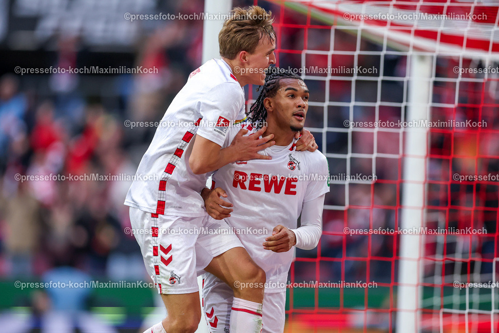 Koe09112402237 | 09.11.2024, 1. FC Köln - SpVgg Greuther Fürth, 2. Fußball Bundesliga, RheinEnergieSTADION, Saison 2024 2025: Torjubel nach dem 1:0 für Köln. Timo Hübers (1.FC Köln #4) zusammen mit Torschütze Damion Downs (1.FC Köln #42)DFB regulations prohibit any use of photographs as image sequences and or quasi-video.