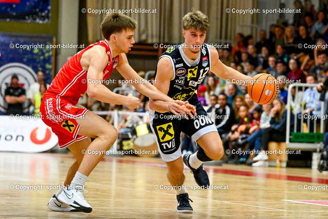 AUT, BSL, Flyers Wels vs Basket Swans Gmunden | 02.11.2024, Raiffeisen Arena Wels, AUT, BSL, Flyers Wels vs Basket Swans Gmunden, im Bild Dejan Kovacevic of Raiffeisen Flyers Wels, Jakob Lohr of Basket Swans Gmunden// BSL, Basketball Super League Match between Flyers Wels and Gmunden Swans, Austria on 2024/11/02