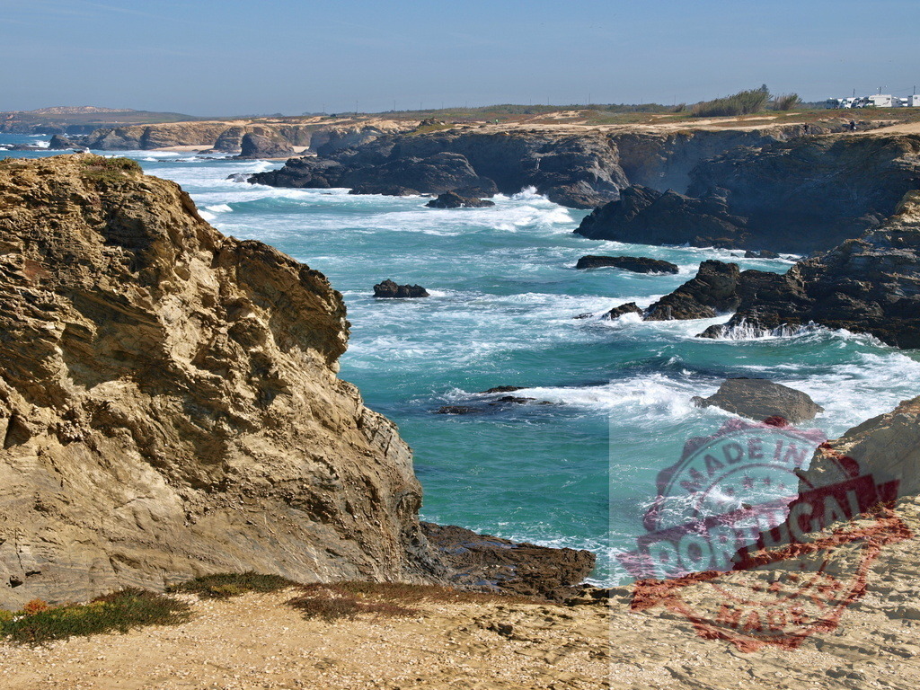 Alentejo rugged coastline with turquoise water and waves | Portuguese Atlantic Ocean coastline with dramatic cliffs, rock formations, and crashing waves - Realized with Pictrs.com