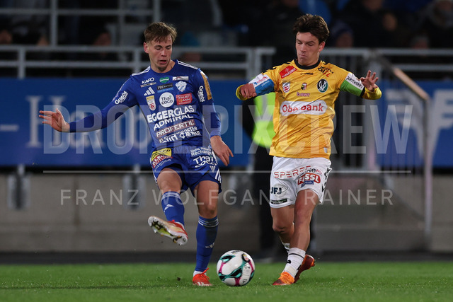 TSV Egger Glas Hartberg vs SV Oberbank Ried – Austrian Bundesliga Match | The image shows Fabian Wilfinger (Hartberg) and Mark Grosse (Ried) by fight for the ball, at the Bundesliga match TSV Hartberg vs SV Ried at Profertil Arena Hartberg. 22.11.2025