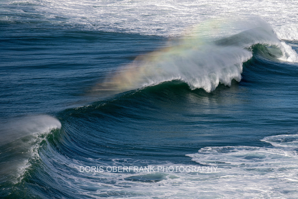 Blue tint mood with rainbow | Nazaré: Blue tint mood with rainbow - Realisiert mit Pictrs.com