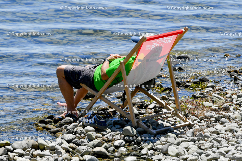 Deutschland_ Baden-Wuerttemberg_ Friedrichshafen am Bodensee_ 19.07.2025-6 | 19.07.2025, Deutschland, GER, Baden Wuerttemberg, Friedrichshafen am Bodensee, im Bild Themenbild, Urlaub, Strand, Sonne, Sommer, See, Ufer, Chillen, Liegestuhl, Touristen, Urlauber, Wasser, Symbolbild, Feature