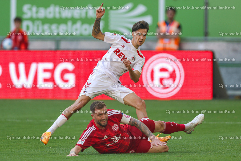 Due21092402136 | 21.09.2024, 2. Fußball Bundesliga, Fortuna Düsseldorf - 1. FC Köln, Merkur Spiel-Arena, Saison 2024 2025:  Denis Huseinbasic (1.FC Köln #8) Andre Hoffmann (Fortuna Düsseldorf #3) DFB regulations prohibit any use of photographs as image sequences and or quasi-video.