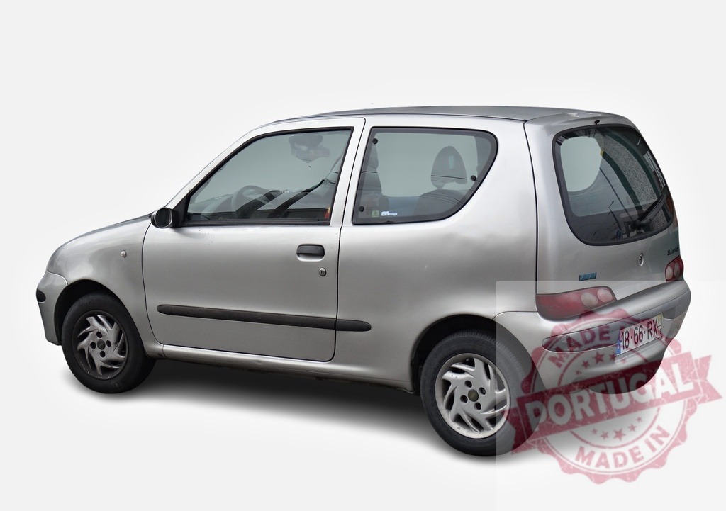 Silver Fiat Seicento parking on white background | Studio shot of a silver Fiat Seicento city car isolated on white background - Realized with Pictrs.com