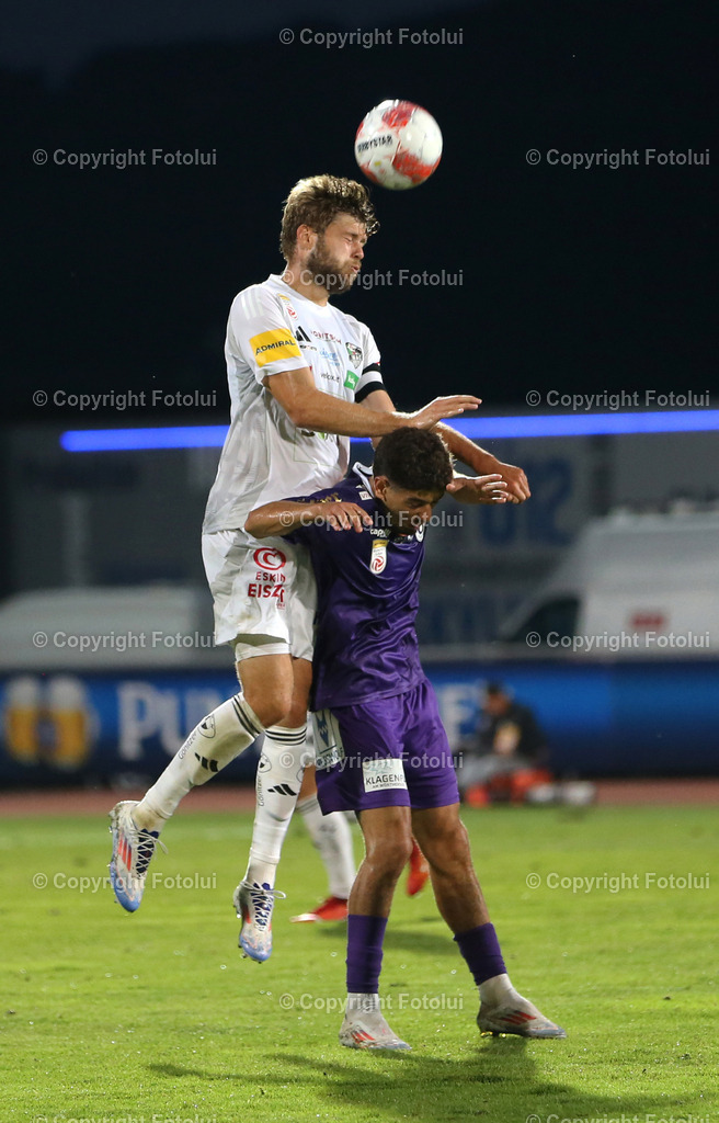 A_LUI_030824_15 | SPORT,FUSSBALL,ADMIRAL BUNDESLIGA RC PELLETS WAC-AUSTRIA KLAGENFURT 03.08.2024 IM BILD: DOMINIK BAUMGARTNER  (WAC) UND BEN JUSTUS BOBZIEN (A.KLAGENFURT) FOTO:FOTOLUI/MW