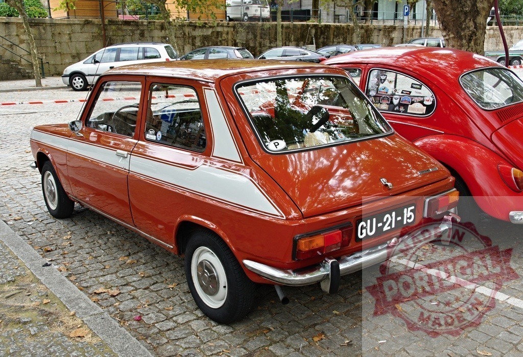 Simca 1100 parked near a Volkswagen Beetle in Guimarães | Rear view of a Simca 1100 parked near a Volkswagen Beetle in Guimarães, Portugal - Realized with Pictrs.com