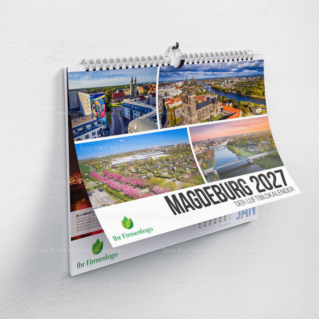 Mockup_Firmenkalender_MD_2027_Cover_qu | Gern – für das Mockup würde ich den Nutzen und die hochwertige Präsentation stärker betonen als das eigentliche Motiv.Das Mockup des Magdeburger Luftbildkalenders vermittelt einen realistischen Eindruck von der hochwertigen Ausführung des fertigen Produkts. Gut erkennbar ist die stabile Spiralbindung, mit der der Kalender dekorativ an der Wand hängt und Monat für Monat seine eindrucksvollen Luftbildmotive präsentiert. So erhalten Interessenten bereits vor der Bestellung einen authentischen Eindruck von Format, Gestaltung und Wirkung des Kalenders im täglichen Einsatz.Das hochwertige Design des Deckblatts unterstreicht den repräsentativen Charakter des Kalenders und macht ihn zu einem attraktiven Blickfang in Büros, Besprechungsräumen, Empfangsbereichen oder privaten Wohnräumen. Die großzügigen Luftbildmotive, das übersichtliche Kalendarium und die Möglichkeit zur Individualisierung mit dem Firmenlogo verbinden regionale Verbundenheit mit einer professionellen Unternehmenspräsentation.Der Magdeburger Luftbildkalender ist weit mehr als ein klassischer Wandkalender. Er vereint außergewöhnliche Luftbildfotografie, informative Inhalte und hochwertige Verarbeitung zu einem exklusiven Werbegeschenk mit langfristiger Wirkung. Durch die individuelle Gestaltung mit Firmenlogo und QR-Code bleibt Ihr Unternehmen das ganze Jahr über sichtbar und präsentiert sich auf sympathische Weise im regionalen Umfeld. - Realisiert mit Pictrs.com