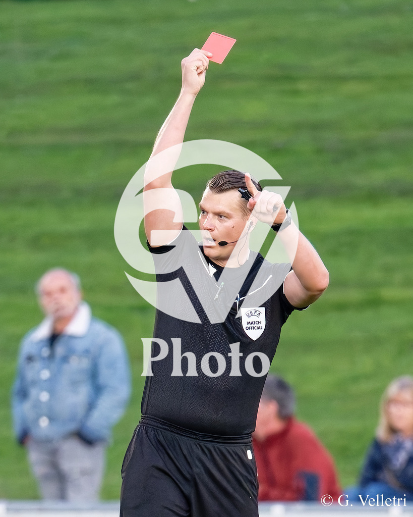 UEFA Region's Cup - Vaud v Munster | Joni Hyytiä referee gives red card to Yanis Marolany (17 Vaud) during the UEFA Region's Cup game between Vaud and Munster at Centre Sportif de Colovray in Nyon, Switzerland 