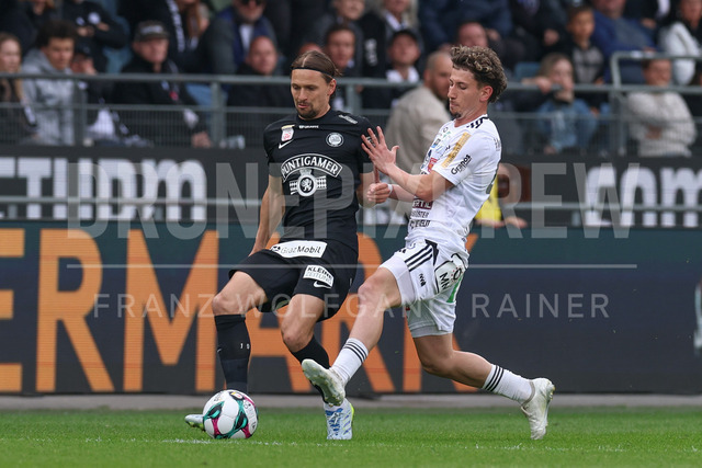 SK Puntigamer Sturm Graz vs TSV Egger Glas Hartberg – Championship Group    | Graz, Austria, 12.Apr.26 - SOCCER - ADMIRAL Bundesliga, SK Puntigamer Sturm Graz vs TSV Egger Glas Hartberg. The image shows Stefan Hierlaender (STU) and Damjan Kovacevic (Hartberg).    