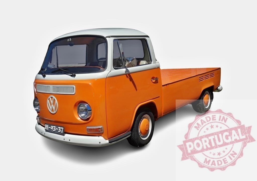 Classic orange and white Volkswagen T1 pickup truck standing still | Restored Volkswagen T1 single cab pickup truck in orange and white, parked on a white background - Realized with Pictrs.com