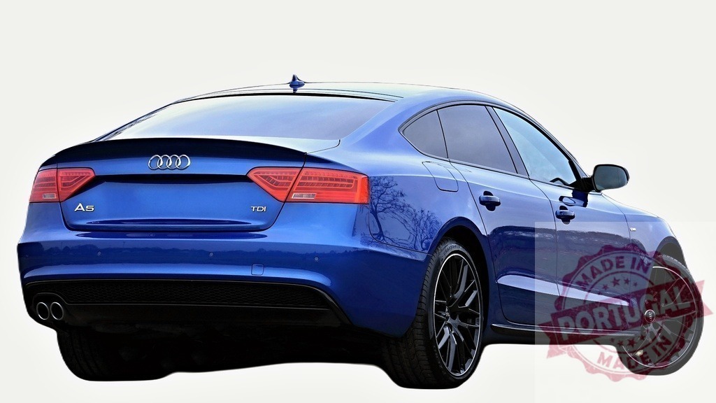 Modern blue Audi A5 TDI sportback showing its rear side | Stylish blue Audi A5 TDI sportback parked and showing its back, isolated on white - Realisiert mit Pictrs.com