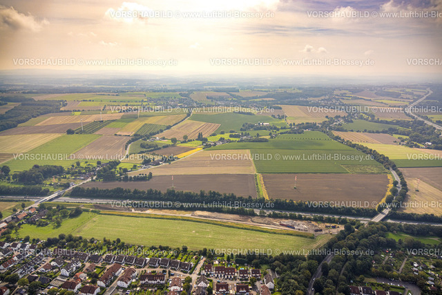Unna230901096 | Luftbild, Wiesen und Felder mit Baugebiet an der Autobahn A44 und Feldstraße, Wohnsiedlung Pappelweg, Unna, Ruhrgebiet, Nordrhein-Westfalen, Deutschland