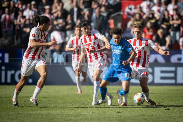 German Bundesliga,  1. FC Koeln - Bayer 04 Leverkusen, 25.04.2026 | KOELN, GERMANY - APRIL 25, 2026 :  Jahmai Simpson-Pusey (1. FC Koeln, 22), Felipe Chavez (1. FC Koeln, 27), Eliesse Ben Seghir (Bayer 04 Leverkusen, 17), Sebastian Sebulonsen (1. FC Koeln, 28) during the German Bundesliga match on gameday 31 between 1. FC Koeln - Bayer 04 Leverkusen at RheinEnergieSTADION on April 25, 2026 in Koeln, Germany. DFL REGULATIONS PROHIBIT ANY USE OF PHOTOGRAPHS AS IMAGE SEQUENCES AND/OR QUASI-VIDEO.