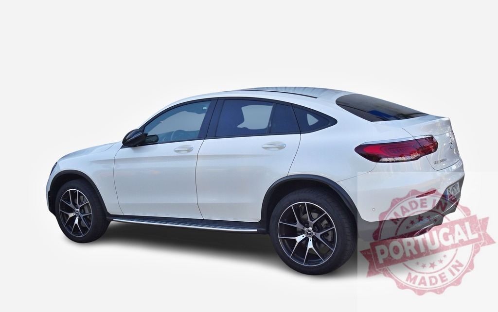 White Mercedes-Benz GLC Coupe parked on white background | Modern white Mercedes-Benz GLC Coupe parked on a white background, showcasing its sleek design and luxury features - Realisiert mit Pictrs.com