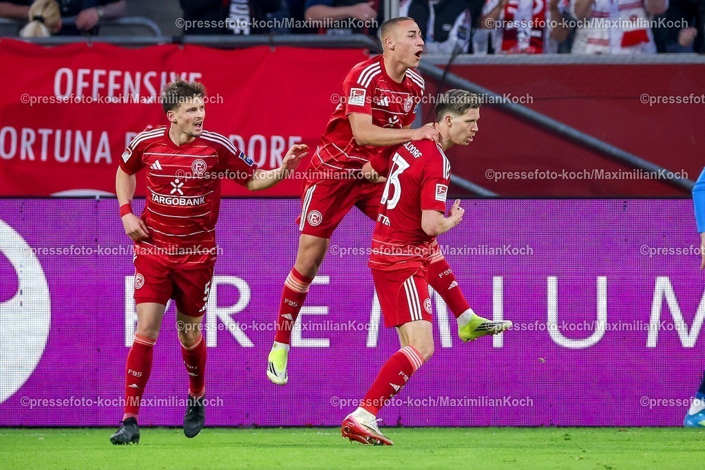 F9510042601090 | 10.04.2026, Fußball, Fortuna Düsseldorf - Holstein Kiel, 2. Fußball Bundesliga, Herren, Merkur Spiel-Arena, 29. Spieltag, Saison 2025 2026: Torjubel nach dem Tor zum 1:1 durch Torschütze Cedric Itten&nbsp;(Fortuna Düsseldorf #13)  zusammen mit  Marin Ljubicic&nbsp;(Fortuna Düsseldorf #20) Moritz Heyer&nbsp;(Fortuna Düsseldorf #05)  DFB regulations prohibit any use of photographs as image sequences and or quasi-video.