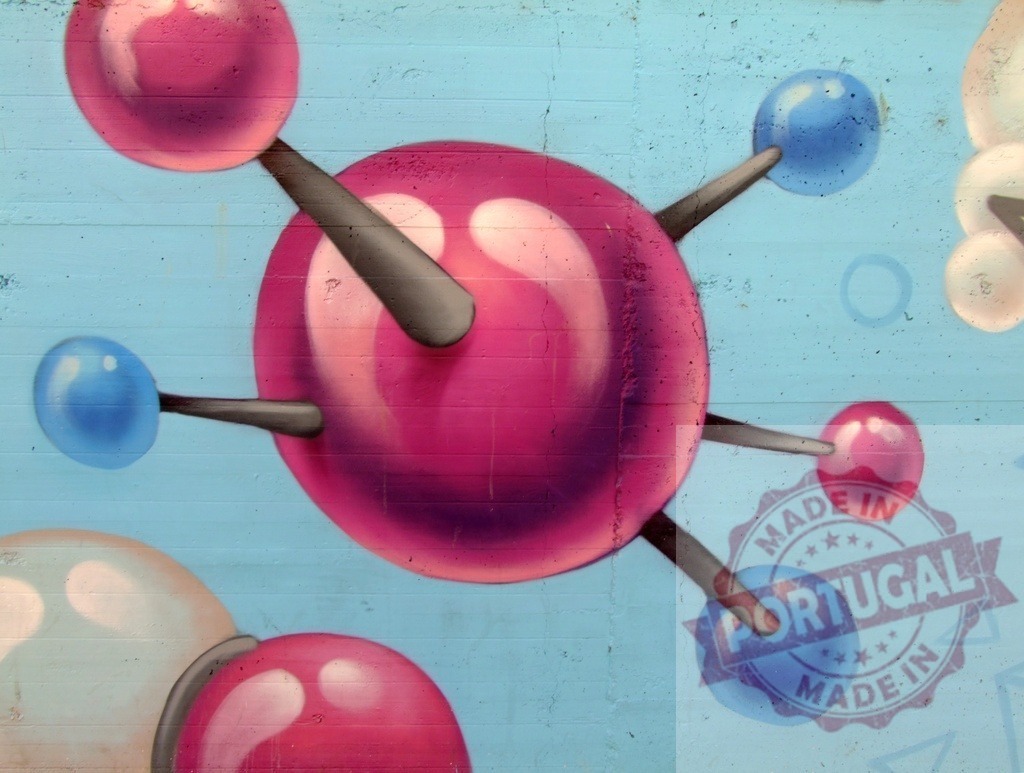 Colorful molecule graffiti mural showing chemistry and science | Vibrant street art painting atomic structure and molecular bonds on a concrete wall - Realized with Pictrs.com