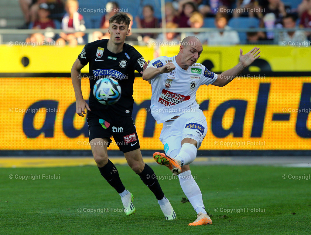 A_LUI_120823_0013 | SPORT,FUSSBALL,ADMIRAL BUNDESLIGA STURM GRAZ-AUSTRIA KLAGENFURT IM BILD:LEON GRGIC (STURM GRAZ) UND NICOLAS WIMMER (KLAGENFURT) FOTOLUI/MW