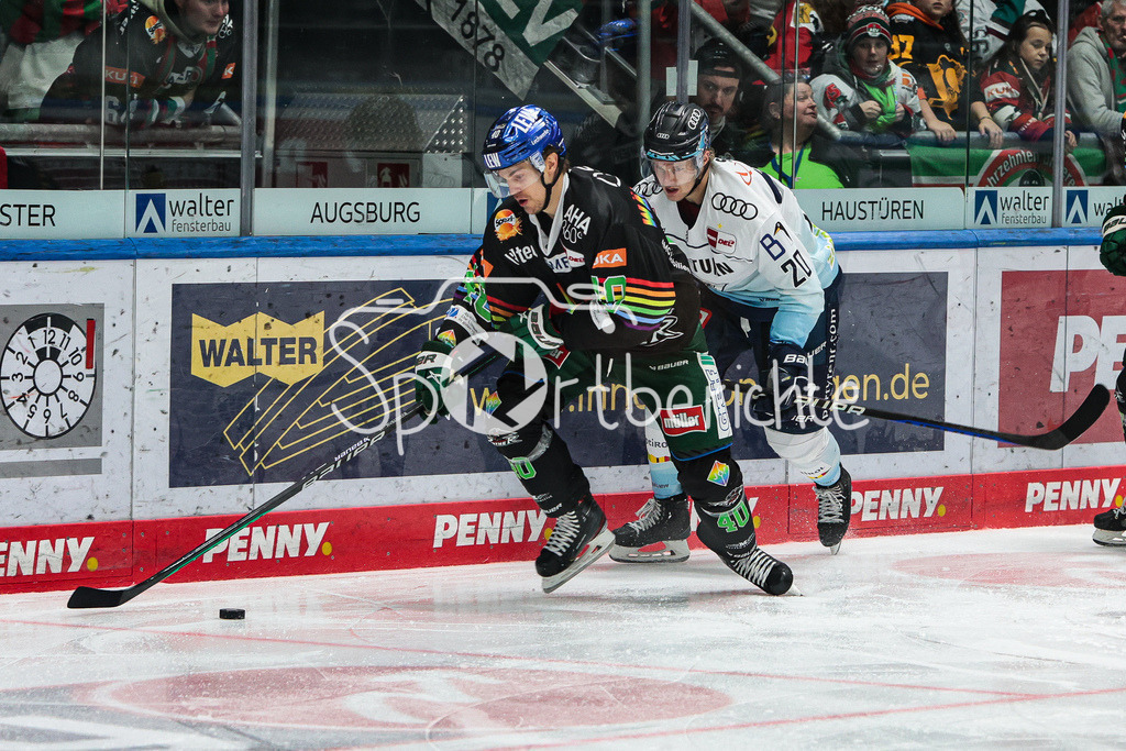 Augsburger Panther - ERC Ingolstadt | Sebastian WAENNSTROEM (AEV #40) im Duell mit Emil QUAAS (ING #20)