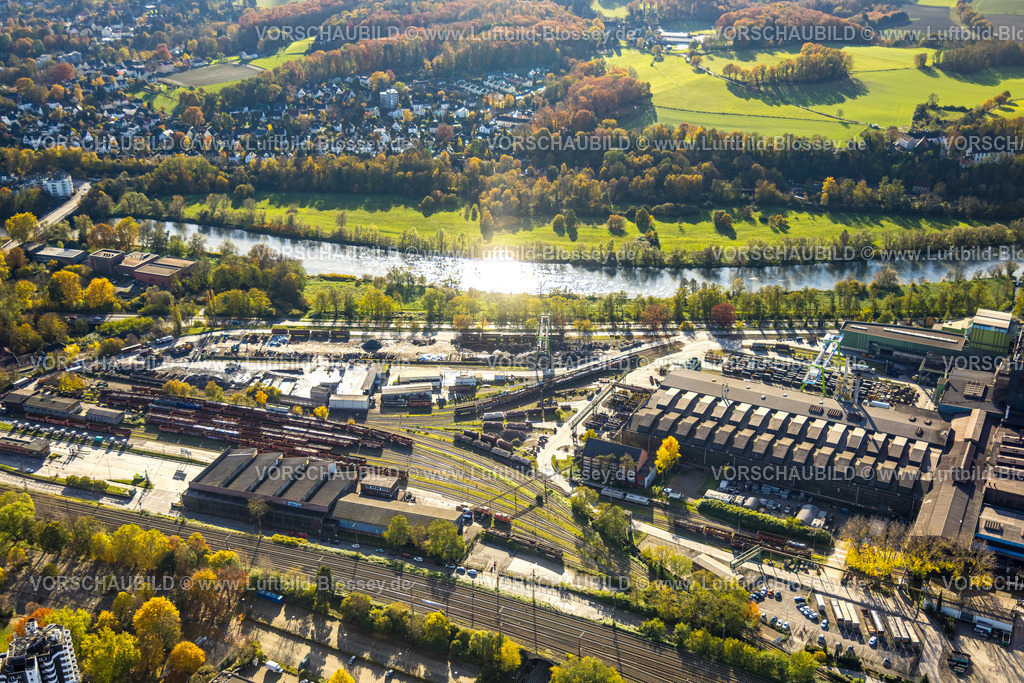 Witten231101178 | Luftbild, Deutsche Edelstahlwerke Specialty Steel GmbH & Co. KG, Hauptverwaltung Witten, am Fluss Ruhr und Ruhraue im Gegenlicht, herbstlicher Wald mit Wohngebiet Ortsteil Bommern, Witten, Ruhrgebiet, Nordrhein-Westfalen, Deutschland
