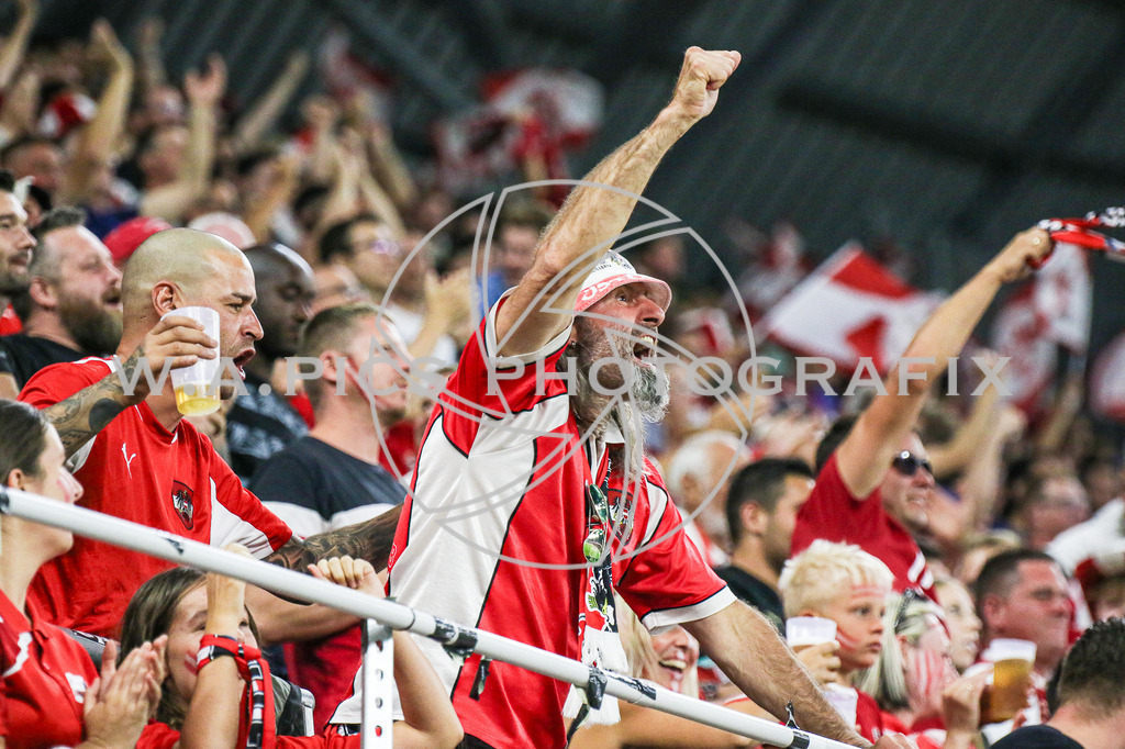 AUSTRIA vs MOLDAVIA | LINZ,AUSTRIA,07.SEPT.23 - INT.SOCCER - AUSTRIA vs MOLDAVIA.  Image shows a fan of the the team of Austria. 
Photo: Sportmediapics.com/ Andreas Willdoner