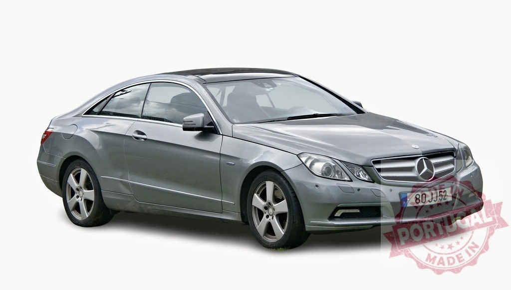 Mercedes-Benz E-Class Coupe showing its elegance and style | Silver Mercedes-Benz E-Class Coupe parked on a white background, showcasing its luxurious design - Realisiert mit Pictrs.com